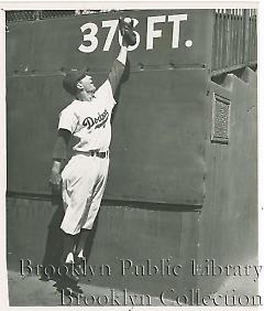 [Carl Furillo practicing in right field]