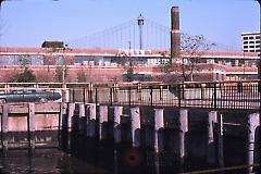 [building in DUMBO with Manhattan bridge in background]