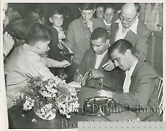 [Roy Campanella at book signing]
