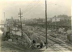 Looking west from 8th Ave. bridge showing general view of steel work on station canopies