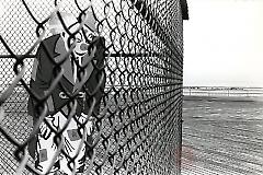 [Clown on Coney Island boardwalk]