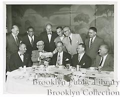 [Men at banquet]