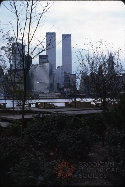 View of Manhattan skyline from pier at Fulton Ferry Landing, 1975. DUMBO, Brooklyn Waterfront photographs and slides